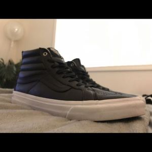 Vans black leather high tops
